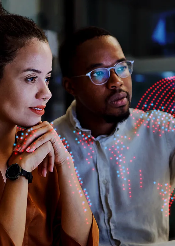 Man and Woman looking at a computer screen 